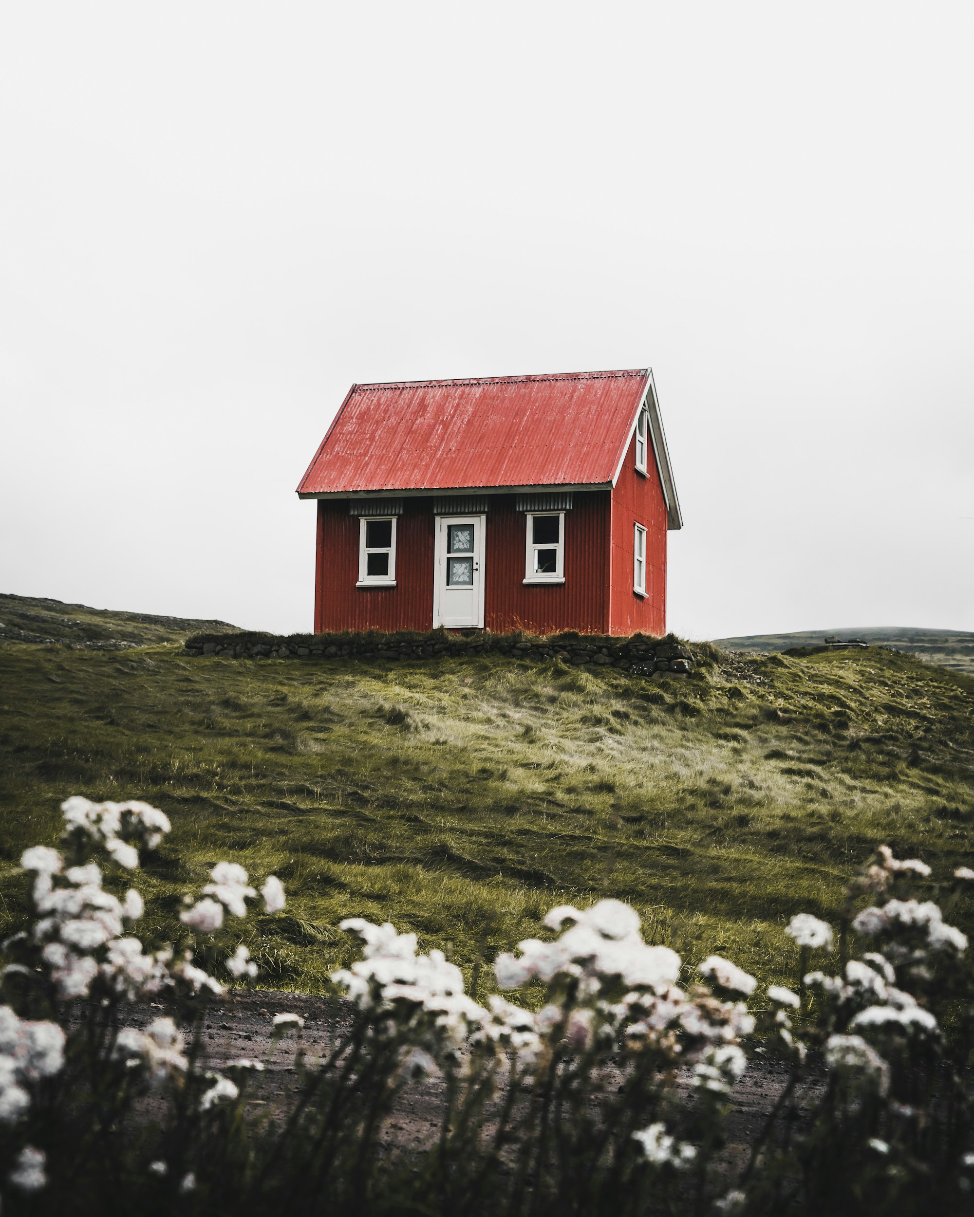 A small house on a quiet hill, used as atmosphere for a village practice